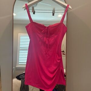 Brand New. Pink dress. Never worn. Size L fits like a medi um